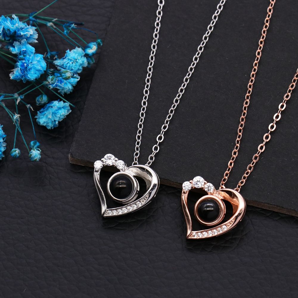 Heart pendant projection best sale necklace